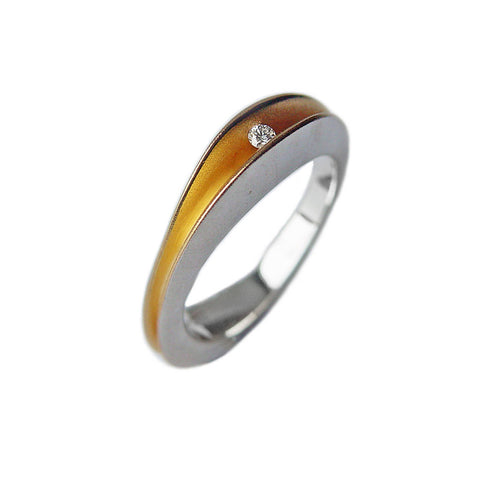 Partially split silver shell ring with 3pt diamond and 22K gold plated interior