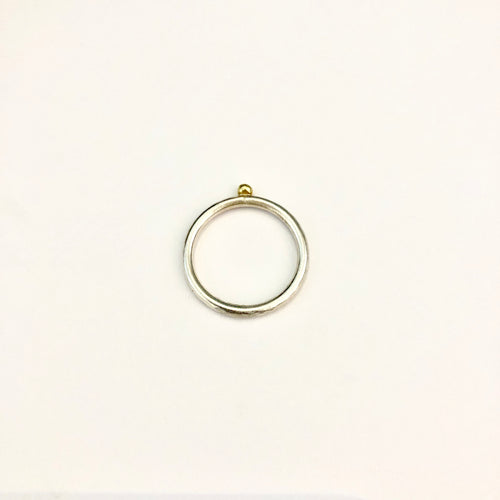 Hammered textured sterling silver round band with 18k gold ball