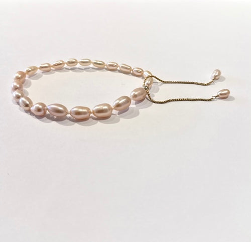 Cosmic Snake Bracelet – Gold & Peach Pearls