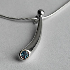All silver small curved silver pendant