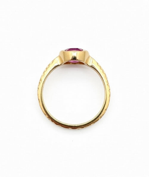 Oval Ruby Bezel Set Solitaire Engagement Ring with Hammered Texture