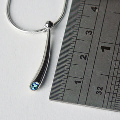 All silver small curved silver pendant