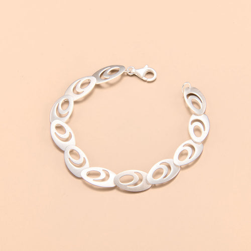 Elegant Oval Negative Space Link Bracelet in Sterling Silver