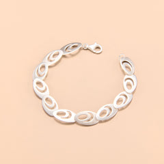 Elegant Oval Negative Space Link Bracelet in Sterling Silver