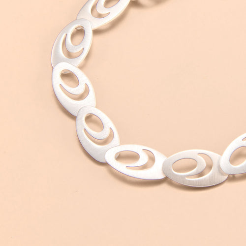 Elegant Oval Negative Space Link Bracelet in Sterling Silver