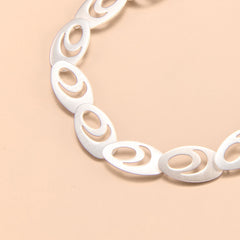 Elegant Oval Negative Space Link Bracelet in Sterling Silver