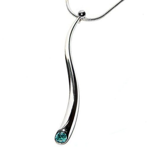 Long curving silver pendant with gemstone and silver detail