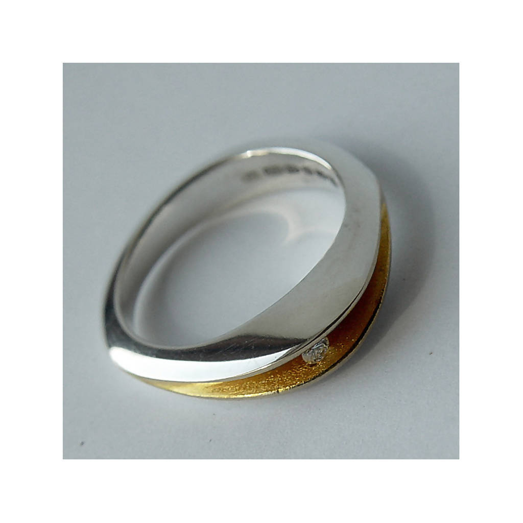 Partially split silver shell ring with 3pt diamond and 22K gold plated interior
