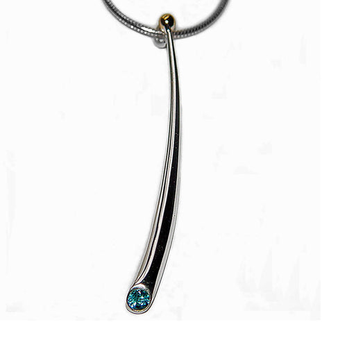 Long curved wiggly pendant with blue topaz & 18K gold detail
