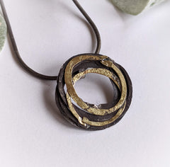 Oxidized Silver and 18K Gold Wrap Pendant
