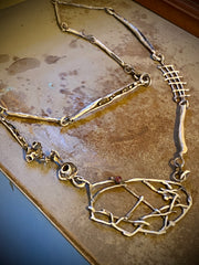 Sculptural Long Necklace with Garnet