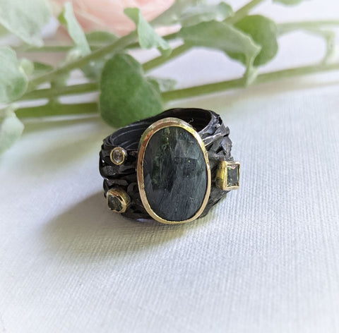 Folded ring with Peridot