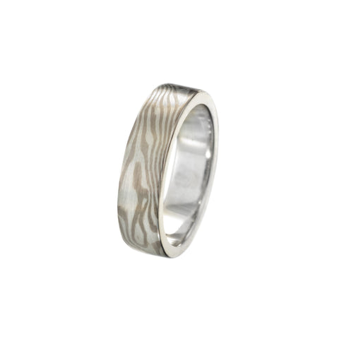 Titanium woodgrain pattern ring