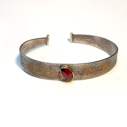 Reticulated Silver Cuff set with  rose cut Garnet and 18k gold powder accent