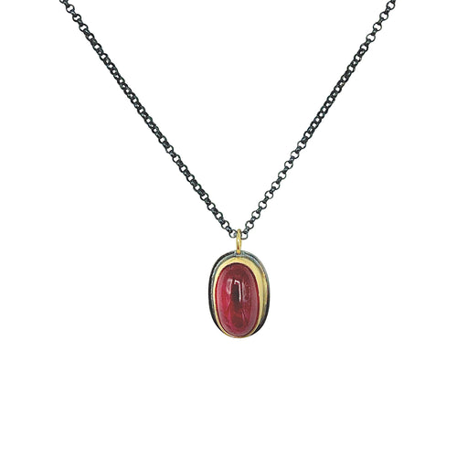 Large Brazilian pink tourmaline cabochon necklace set in 18k gold on oxidized sterling chain