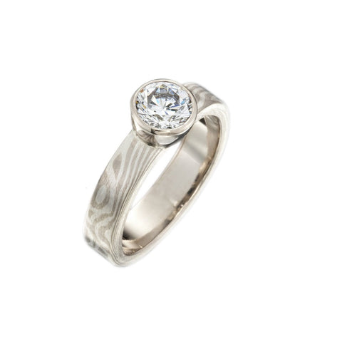 Diamond Solitaire Ring with Cluster Diamonds