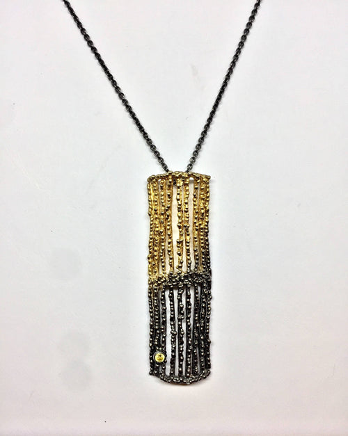 Textured two tone pendant with Peridot
