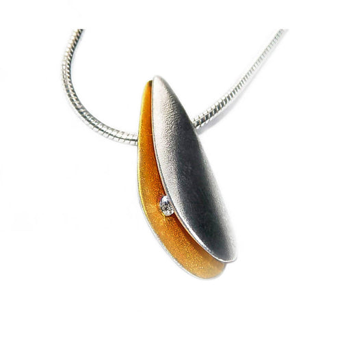 Side silver shell diamond pendant with 22K gold plated interior